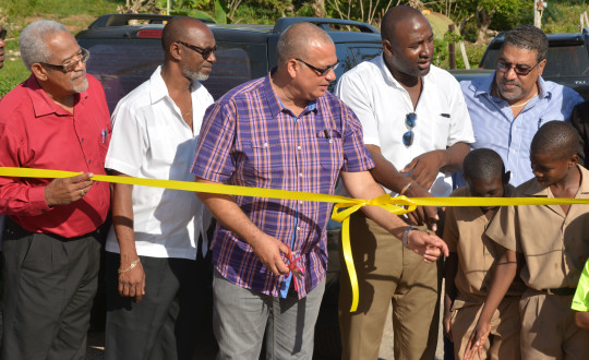 (From Left to Right))  Deputy mayor of St. Ann's Bay Delroy Redway , State Minister in the Ministry of Labour and Social Security Colin Fagan, state minister in the Ministry of Transport, Works and Housing , Richard Azan, MP for North West St. Ann Dr Dayton Campbell and minister of Tourism and Entertainment Dr. Wykeham McNeill, cutting the ribbon for the opening of a Jamaica Emergency Employment Programme (JEEP) in the community of Keith, St. Ann on January 21. 