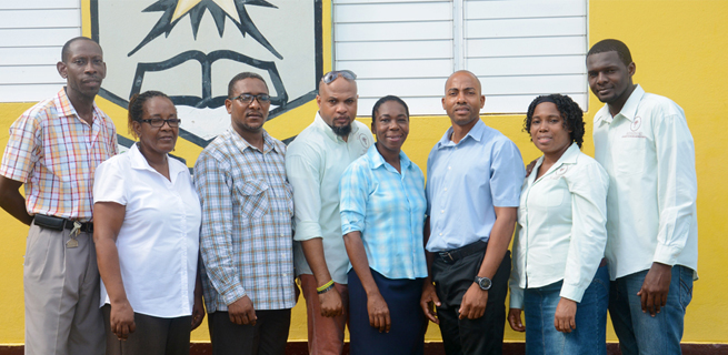 United effort: (From left): Pastor Dennis Taylor, president of the Exchange All Age School PTA; Donival Green, vice principal, Ricardo Moncrieffe, principal, Exchange All Age; Nicholas Hutchinson, president of the Called to Push Ministry; Dolvet McInnis, assistant president of the Exchange All Age School PTA; Avroy Harris, teacher; Sharees Omally- Harris, and Khoran Gibbs, members of the Called to Push Ministry. 